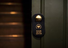 Faux leather hotel room signs