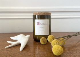 Repurposed wine bottle candle