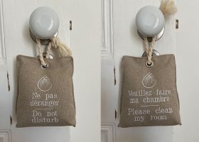 Embroidered do not disturb sign in linen
